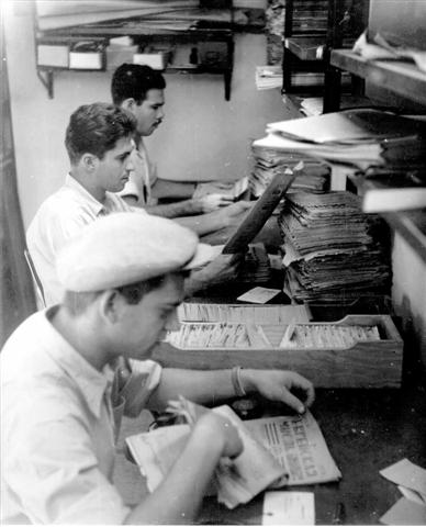 CZA staff catalogizing archival material